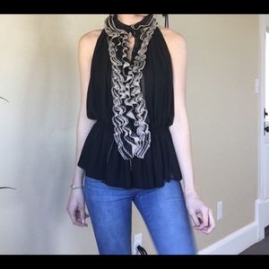 Black and cream ruffled top
